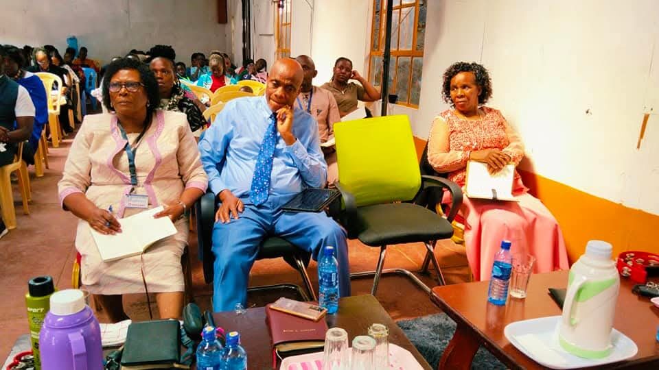 Pastors and leaders seated at a conference
